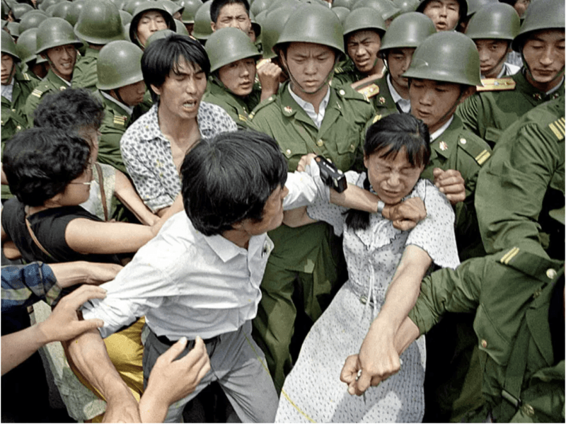 women removed by soldiers