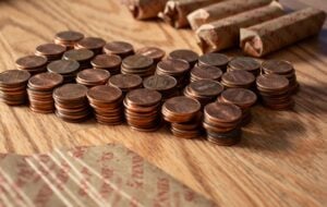 The Penny Problem Has a Third Option: Buy Them Back (With Interest)